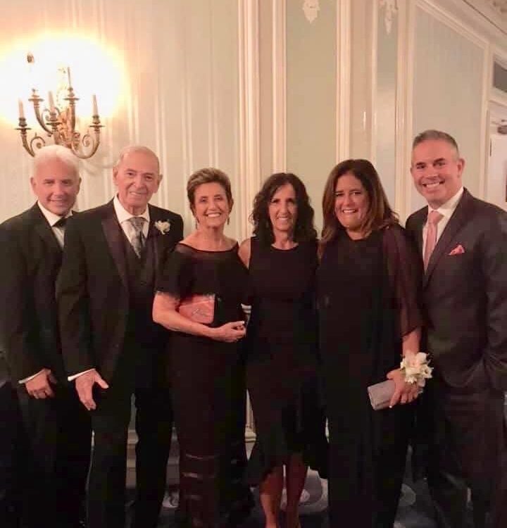 Rob Carlin's dad and some of their family dressed up together at an event