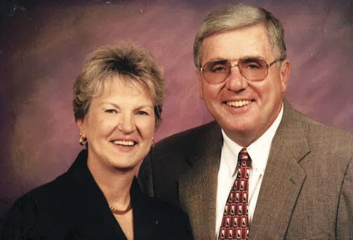 Larry and Georgi dressed fancy for a photo back in the day