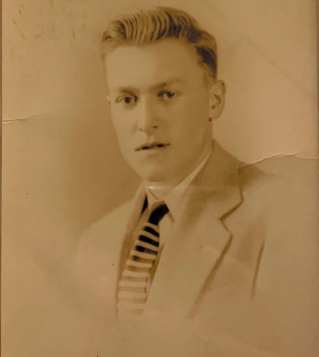 GP Gromacki sepia photo with him dressed up in suit and tie