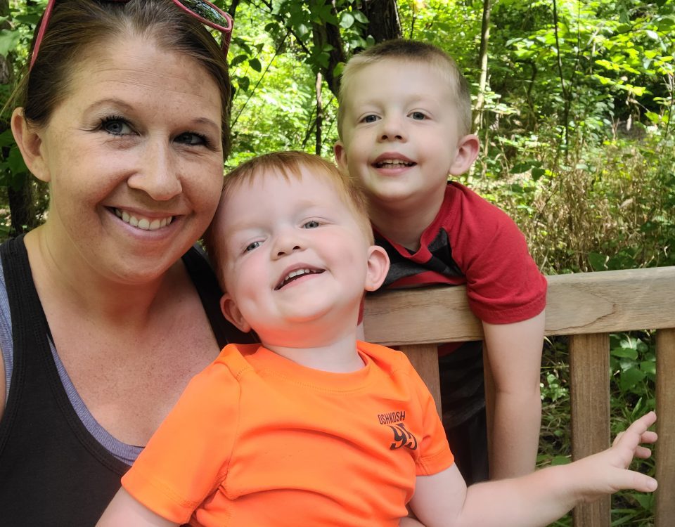 Kim Zaayer and her sons on the park bench