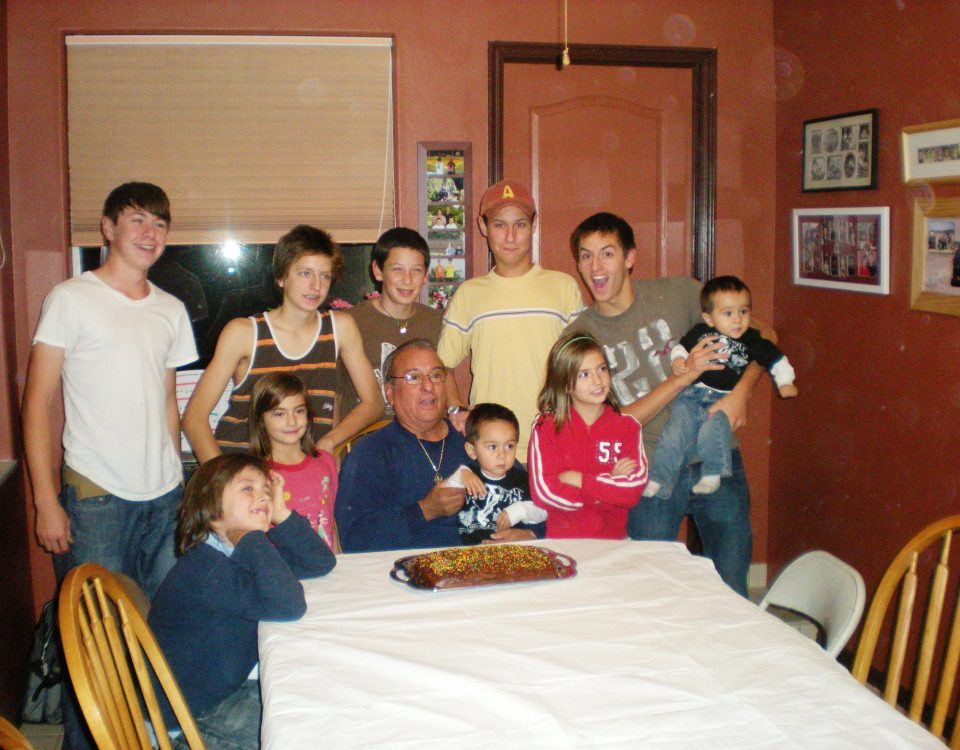 the perez family celebrating thanksgiving with a cake in 2009