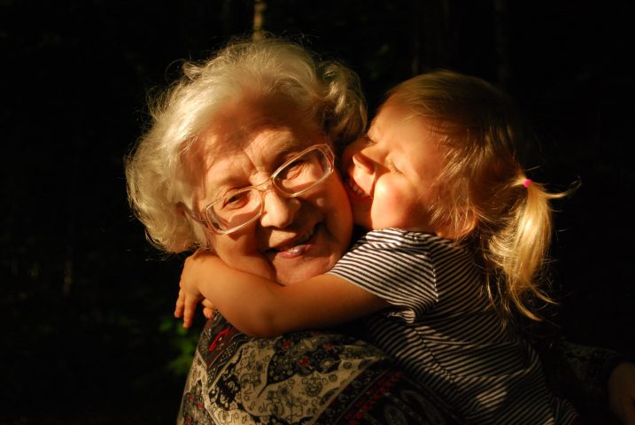 grandma and granddaughter hug