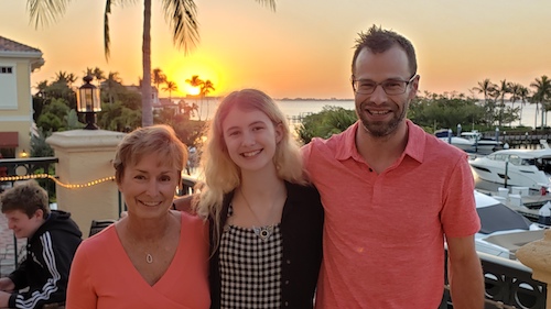 Sherry Kraft hanging out with her son and granddaughter by the boat doc