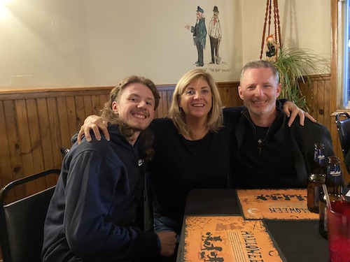 Kim Bell with her husband and son out to eat