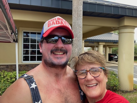 Michele Shearer and her son who is wearing an "American Badass" hat