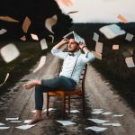 a reader holding a book on his head trying to capture the essence of the story being told