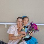 Tesa Harris and daughter embracing after a recital